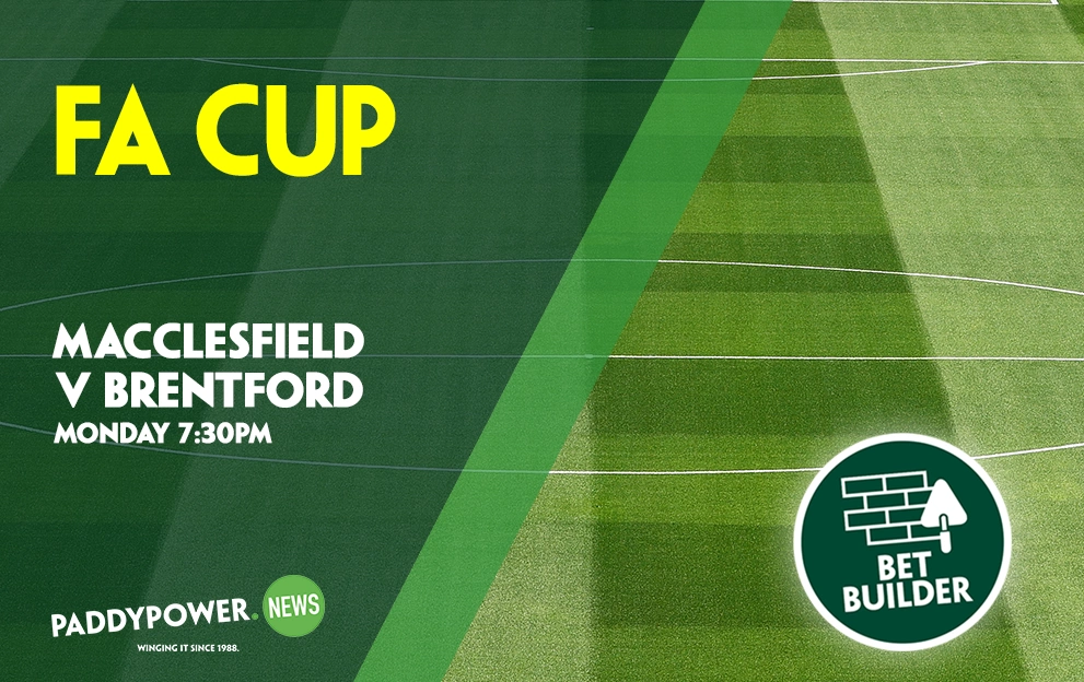 A Newcastle player fires a shot past a Bournemouth goalkeeper in the FA Cup