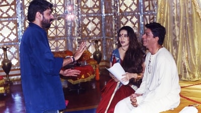Sanjay Leela Bhansali, Madhuri Dixit and Shah Rukh in a behind-the-scenes picture from Devdas.