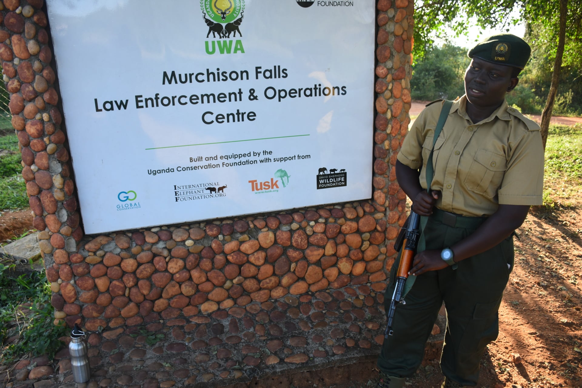 A park ranger stands guard near the entrance to the Murchison Falls Law Enforcement and Operations Centre, which houses the EarthRanger technology that Ugandan authorities use for aerial surveillance of the park