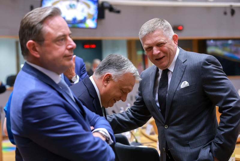 Belgian prime minister Bart De Wever (left) as Viktor Orban and Slovakia's prime minister Robert Fico share a joke at the start of an EU leaders' summit. Photograph: EPA