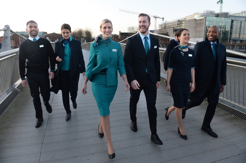 Are Lingus cabin crew members Oisin Leong, Aoife Costelloe, Victoria Elmore, David Rodgers, Eszter Dornfeld and Byron Kumbula in the uniform designed by Louise Kennedy.
Photograph: Dara Mac Dónaill