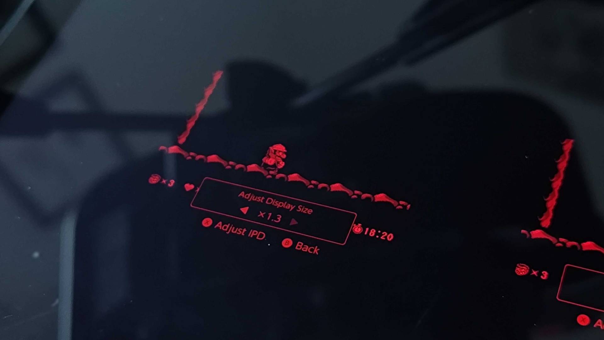 Close up of Virtual Boy with Wairo Land gameplay displayed and screen size dial enabled.