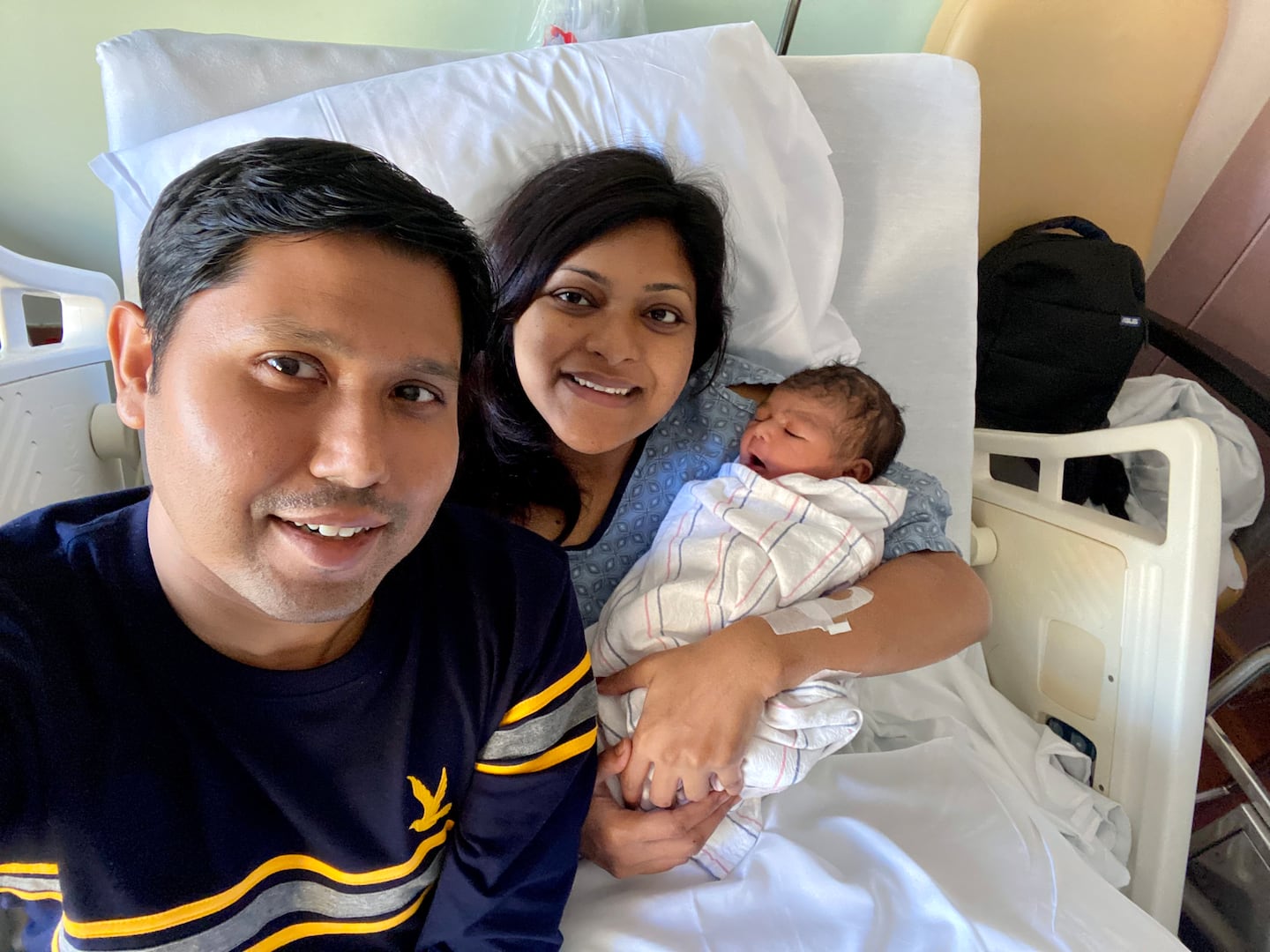 Nabil Haque and Sungida Rashid with their newborn daughter on the morning of her birth. A day later, Rashid experienced severe bleeding and St. Elizabeth's Medical Center in Brighton lacked the necessary equipment to care for her. The equipment had been repossessed after Steward did not pay its bills, the Globe reported. Rashid later died. 
