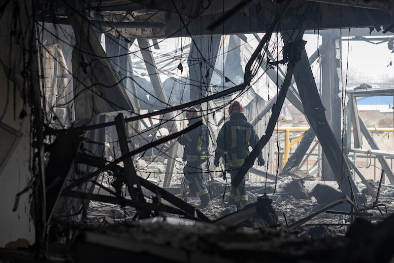 Ukrainian rescuers walk through the rubble of a building heavily damaged in a Russian attack in Odesa last week. Photograph: Oleksandr Gimanov/AFP/Getty