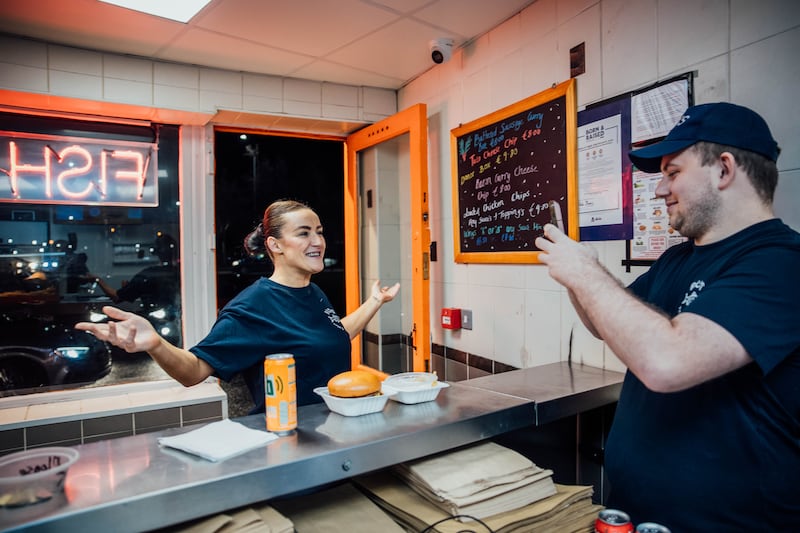Rio's manager Louise Duffy making a social media video with staff member Lee McAllister.  Photograph: Brian Arthur