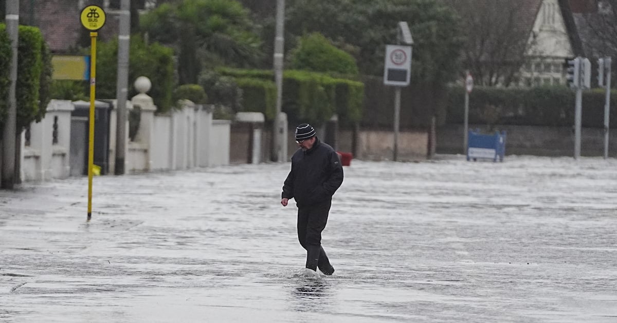People urged to work from home with schools on alert as Met Éireann warns of more rain – The Irish Times