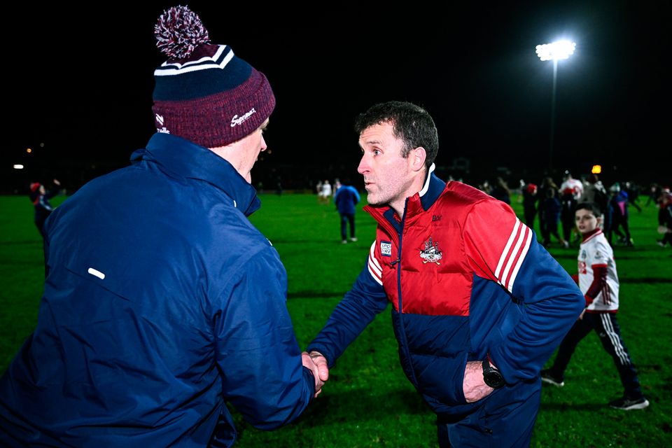 Cork manager Ben O'Connor, right, and Galway manager Micheál Donoghue shake hands