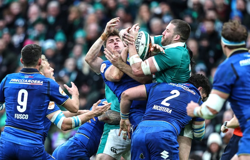 Stuart McCloskey contests for a high ball with Italy's Leonardo Marin. Photograph: Inpho