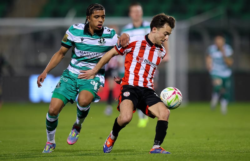 Shamrock Rovers’ Victor Ozhianvuna and Darragh Markey of Derry City. Photograph: Ryan Byrne/Inpho 