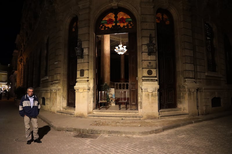 A solitary guard standing watch at Hotel Raquel off Havana’s historic old plaza. Photo by Hannah McCarthy for The Irish Times