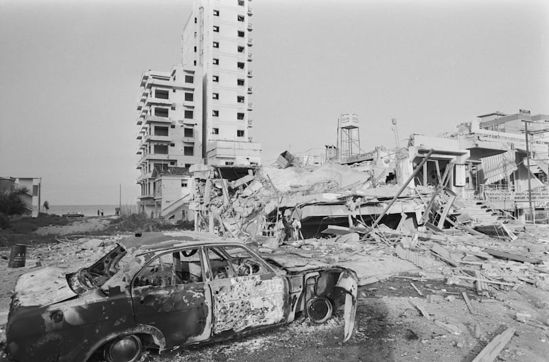 Destruction of cars and buildings during the unrest. Photograph: Harry Dempster/Express/Hulton Archive/Getty