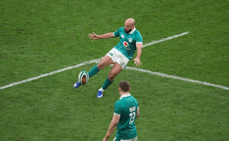 Ireland's Jamison Gibson-Park kicks clear. Photograph: Inpho