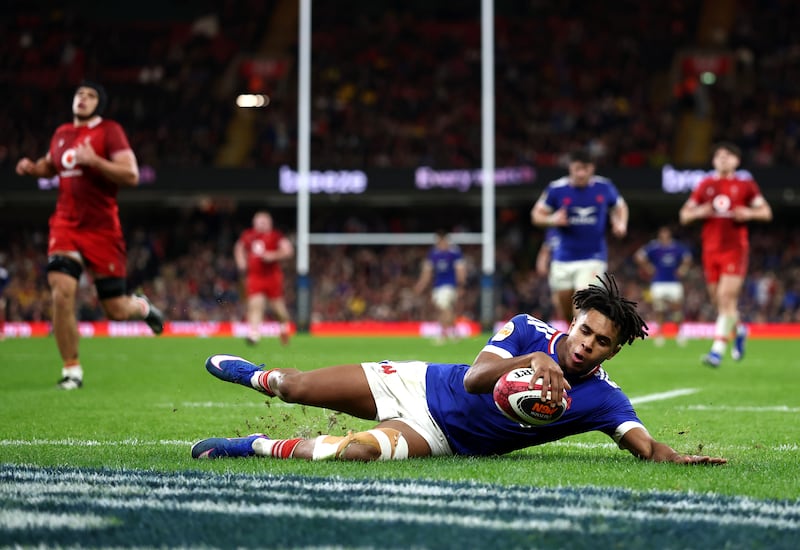 Theo Attissogbe goes over for France's fifth try in Cardiff. Photograph: Dan Istitene/Getty Images