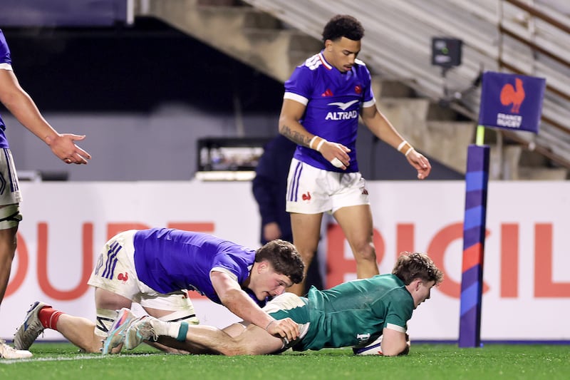 Ireland scrumhalf Christopher Barrett scores  one of his two tries in Perpignan. Photograph: Laszlo Geczo/Inpho