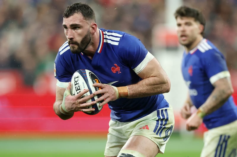Charles Ollivon of France runs with the ball during the match against Ireland at Stade de France. Photograph:  David Rogers/Getty Images
