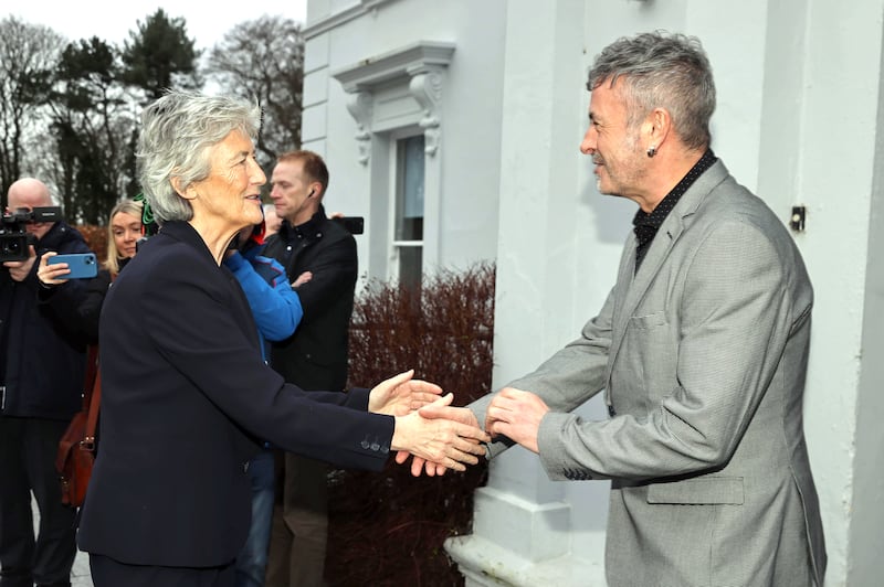 President Catherine Connolly is greeted by Martin McMullan of Youth Action NI at St Columb's Park House Peace and Reconciliation Centre in Derry. Photograph: Liam McBurney/PA 