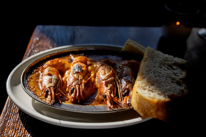 Gambas alla Borgo, with garlic, chilli, lemon, and focaccia. Photograph: Chris Maddaloni