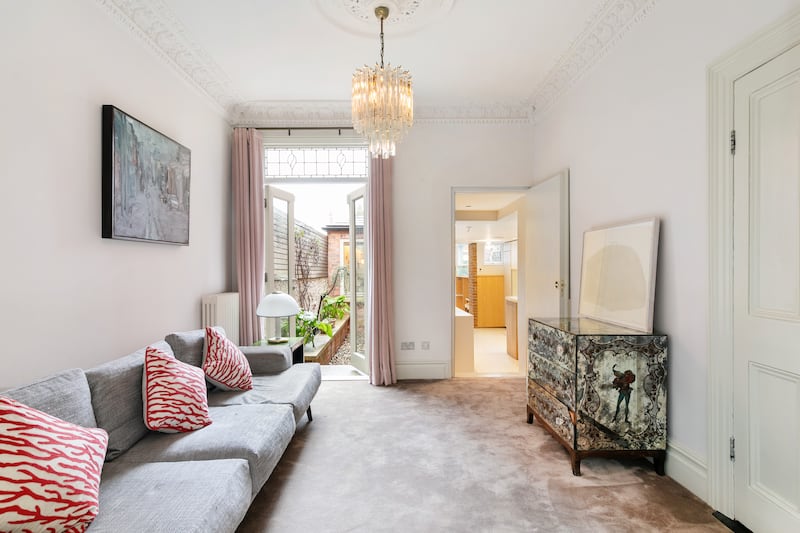 Reception room two now leads to a small inner courtyard that also brings light to the kitchen