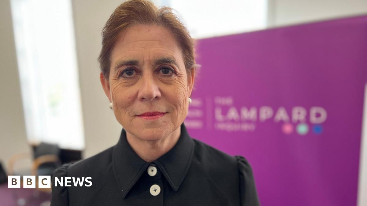 Bereaved relatives affected by mental health deaths in Essex stand outside Arundel House in London. They are holding posters and photographs of loved ones who have died. One is also holding an Essex flag. The largest banner reads: "If mental health trusts in Essex had learned from mistakes, there would be one death instead of thousands of deaths".