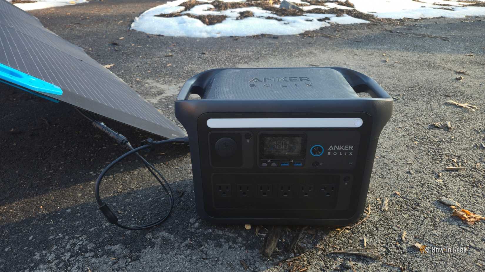 An Anker SOLIX C1000 charging from portable solar panels.