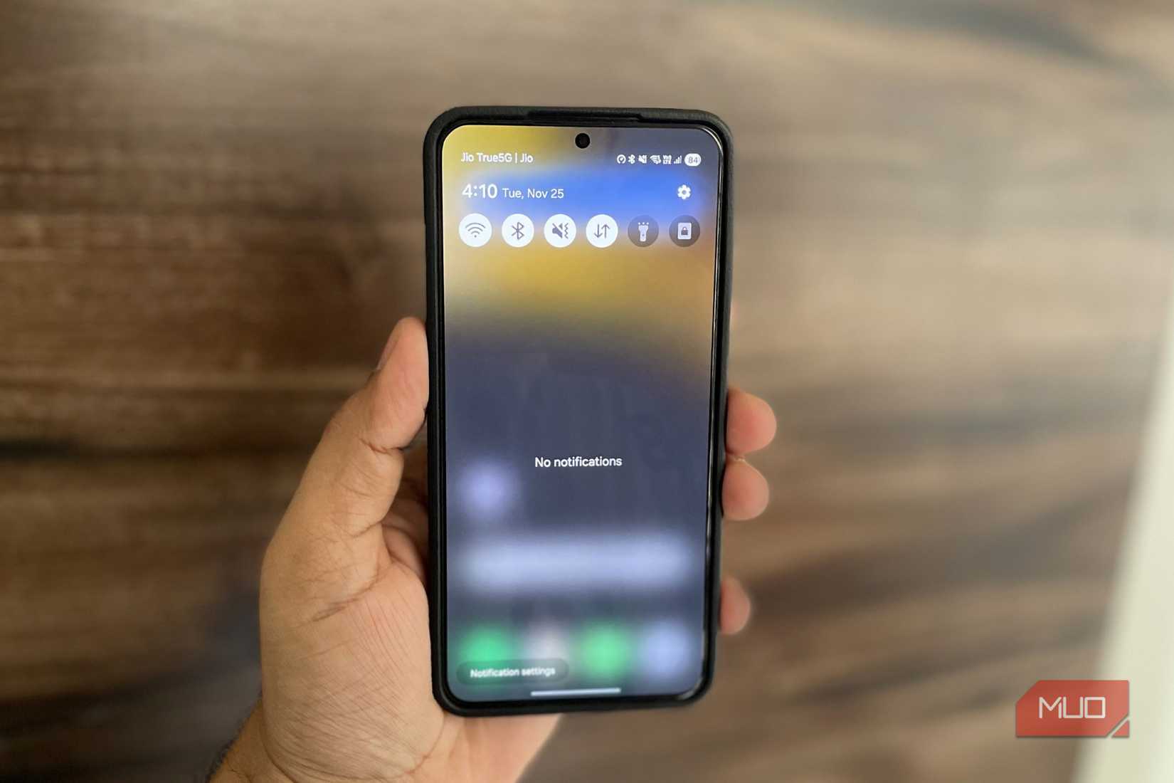 Android phone in hand showing empty notification panel