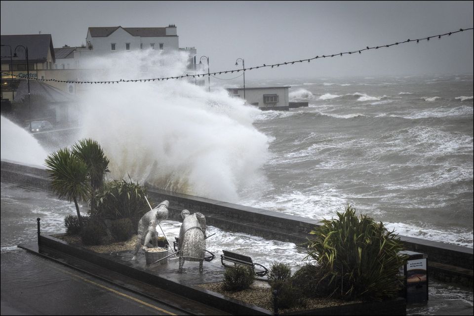 A wave crashes on the shore during the Orange weather alert in Blackrock, Co Louth. Photo: David Conachy