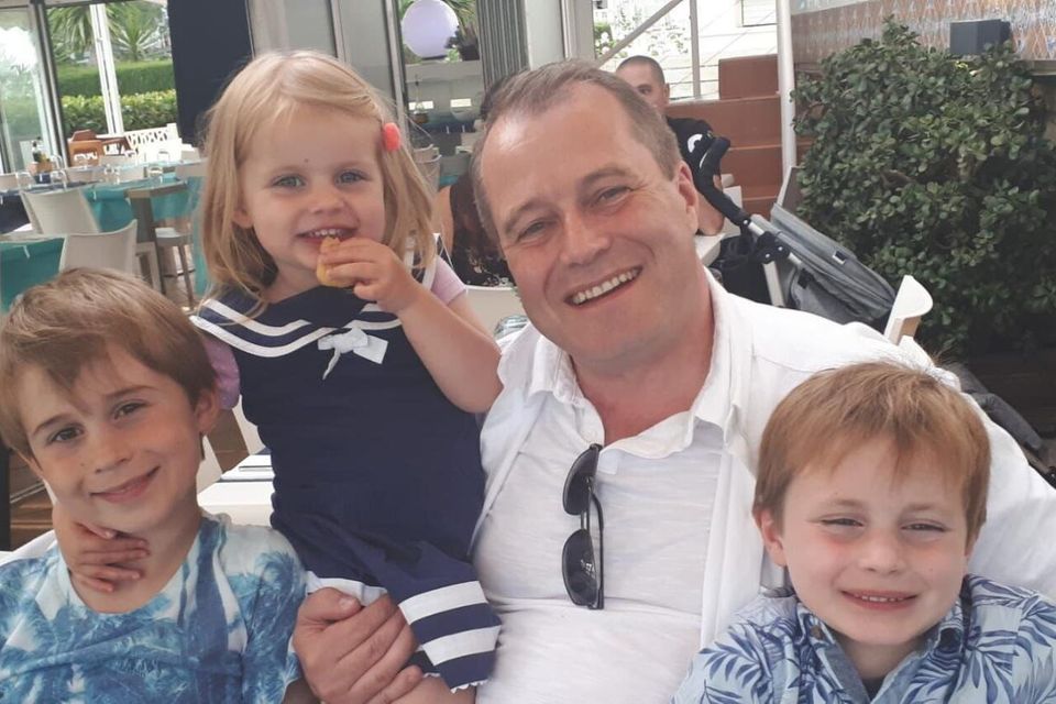 Andrew McGinley with his children, Conor, Carla and Darragh