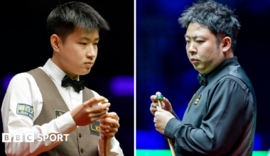 Zhao Xintong and Zhang Anda in a split picture, both chalking their cues. Zhao wears a white shirt with a tan waistcoat and black bowtie, while Zhang is all in black.