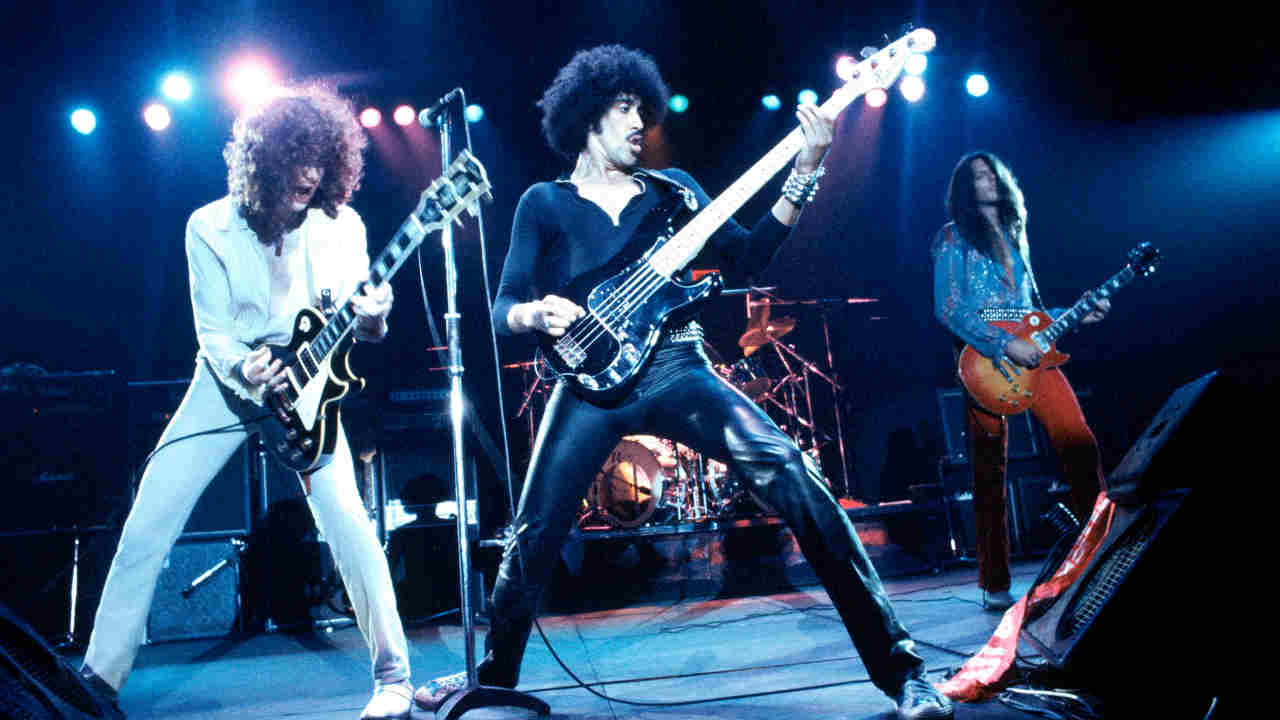 Thin Lizzy performing onstage in the 1970s