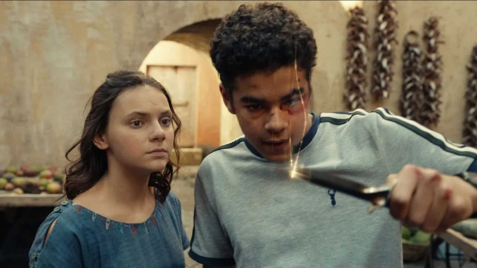 Dafne Keen as Lyra Belacqua with Amir Wilson as Will Parry in His Dark Materials