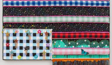 a colorful, patterned textile flag with fringe and glitter by Victoria Dugger