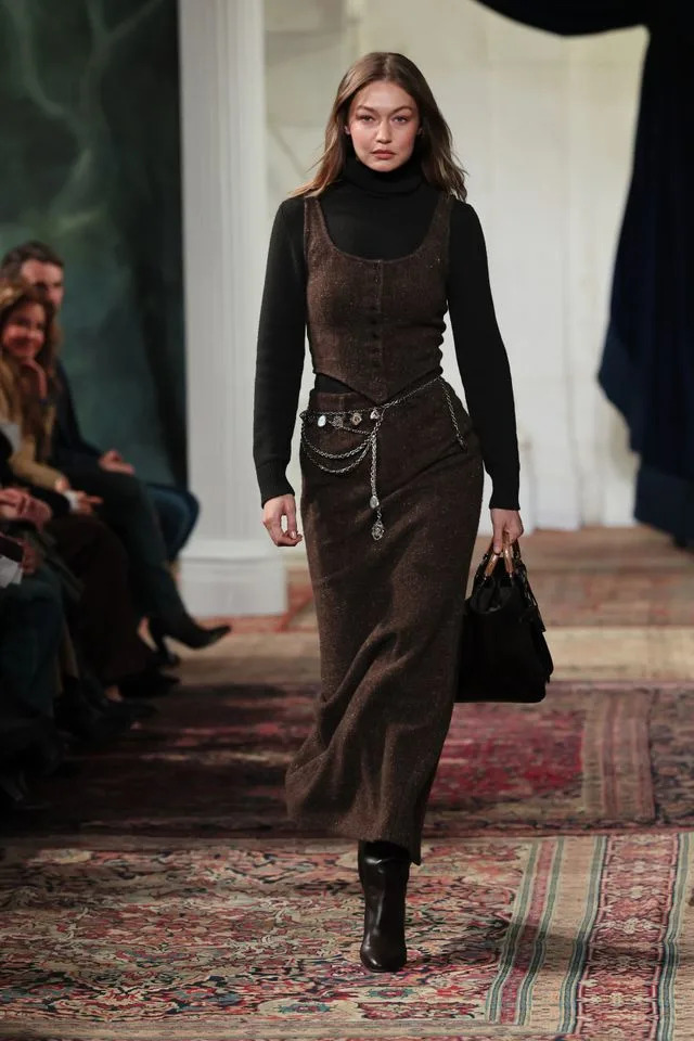 She wore a brown two-piece while walking the runway Getty