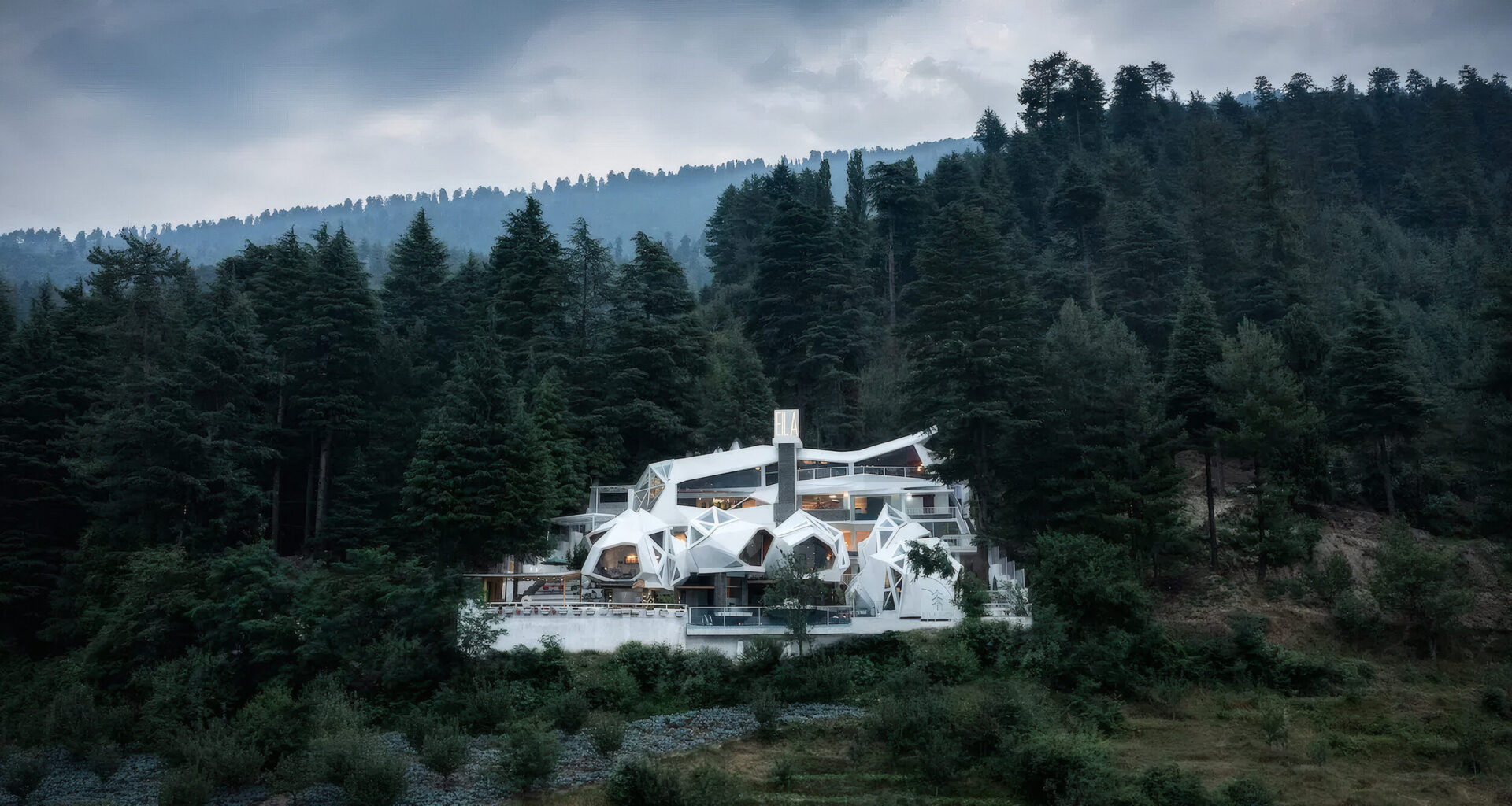 MOFA studio realizes biomorphic art retreat in india with fluid architecture