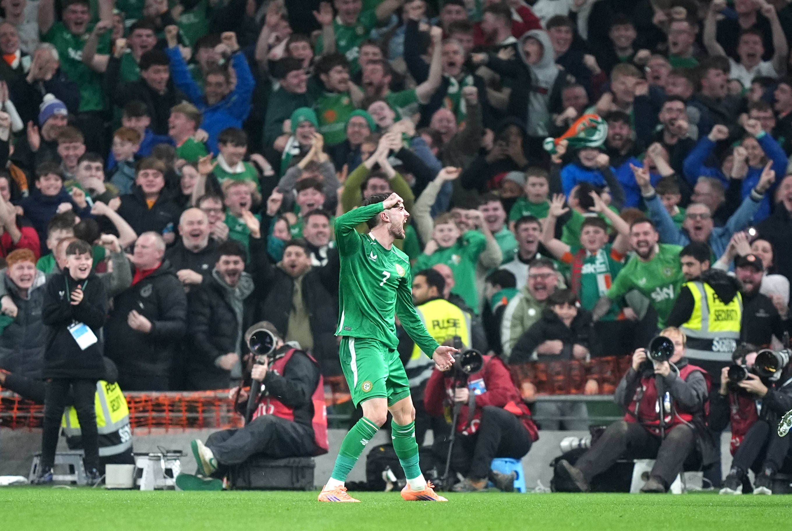 Parrott celebrates in front of the Ireland fans after scoring against Portugal