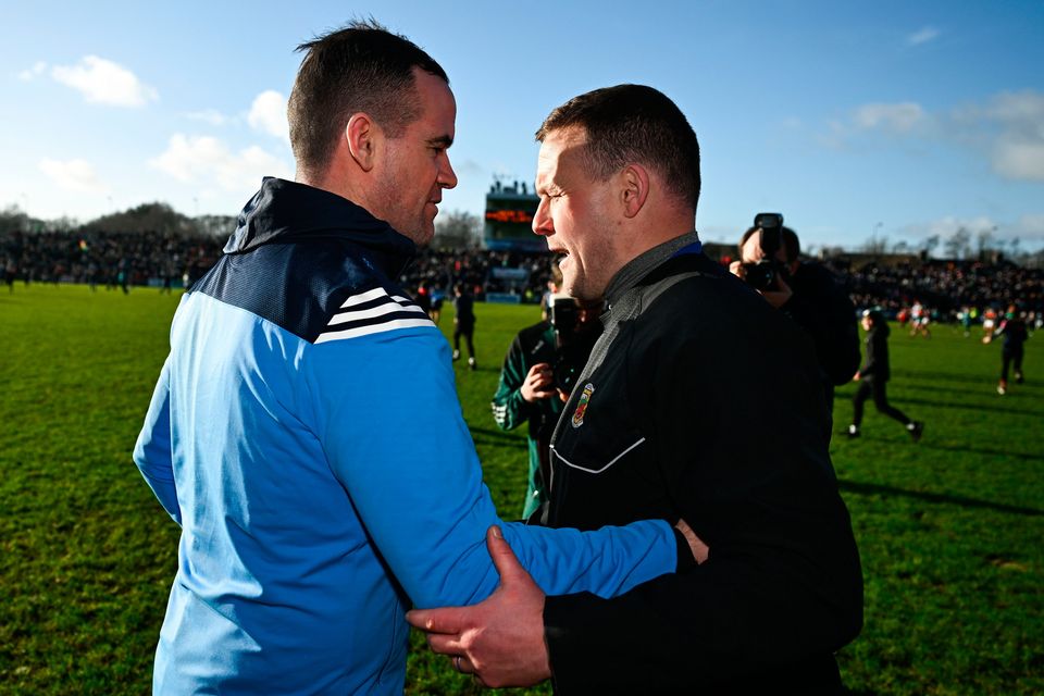 Dublin manager Ger Brennan, left, and Mayo manager Andy Moran chat after the Allianz FL Division 1 match in Castlebar. Photo: Ben McShane/Sportsfile