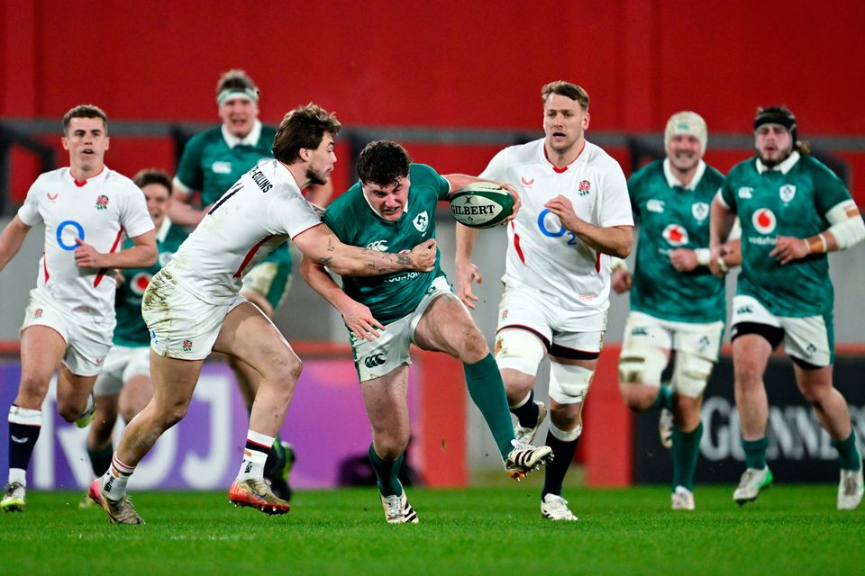 Ireland's Gus McCarthy is tackled by Ollie Hassell-Collins of England A during their match in Thomond Park. Photo: Ramsey Cardy/Sportsfile