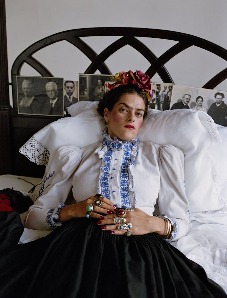 Tracey Emin lying in bed dressed as Frida Kahlo