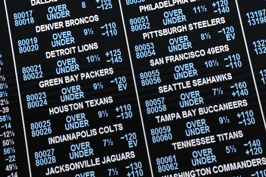 Betting lines are listed at the Westgate SuperBook in Las Vegas in August.