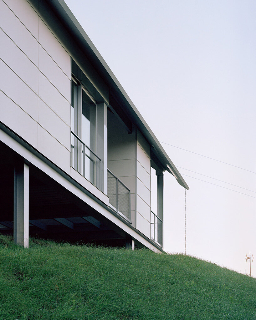 HANGHAR assembles steel-framed prefab residence in 48 hours on sloped spanish plot