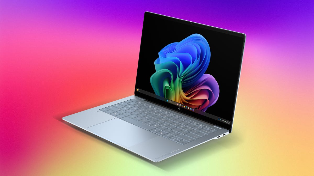 HP OmniBook Ultra 14 laptop displayed on a multicolor background.