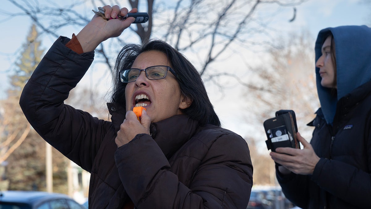 Anti-ICE "rapid responders" use whistles