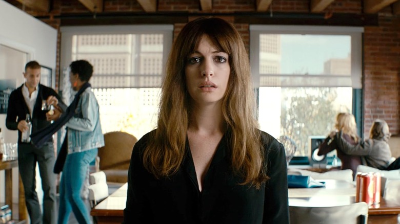 Anne Hathaway as Gloria looking distressed in Colossal
