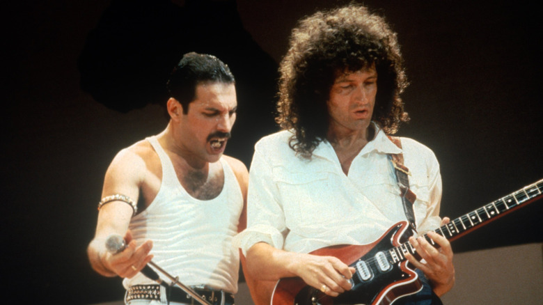Queen's Freddie Mercury and Brian May playing at Live Aid in 1985