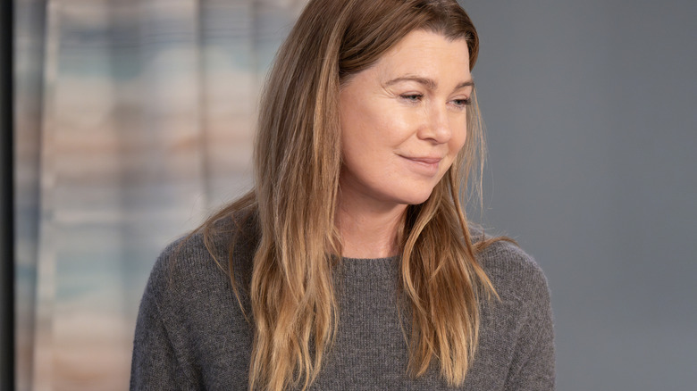 Meredith Grey wearing a grey sweater
