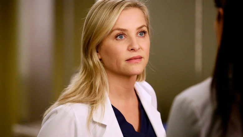 Dr. Arizona Robbins looking stern while wearing a white doctor's coat on Grey's Anatomy
