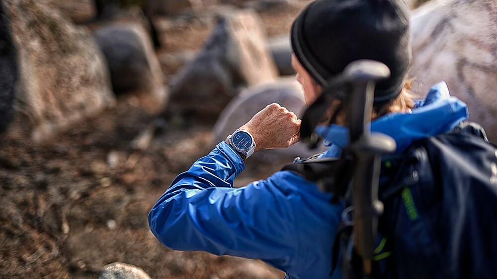 Garmin Fenix 7X Sapphire Solar being used on a hike