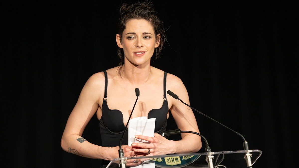Kristen Stewart standing and posing for a photo at the 2025 SFFILM Awards Night.