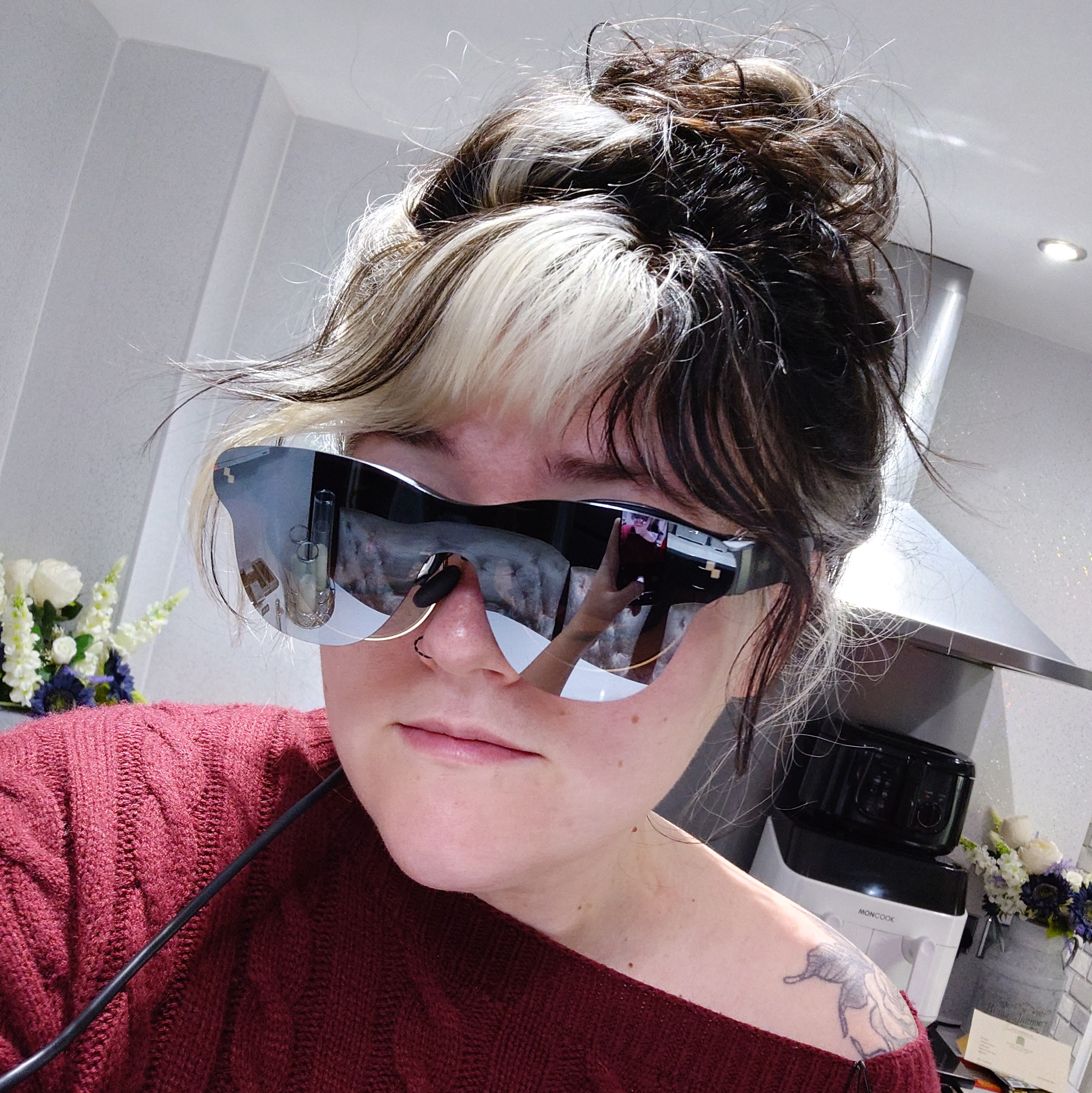 Wearing the RayNeo Air 3s Pro smart gaming glasses