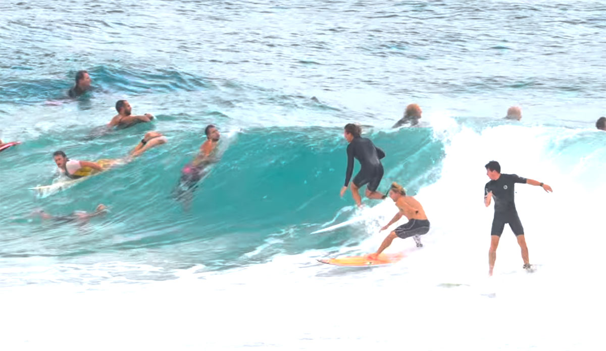 Snapper Rocks surfers navigating a crowded lineup