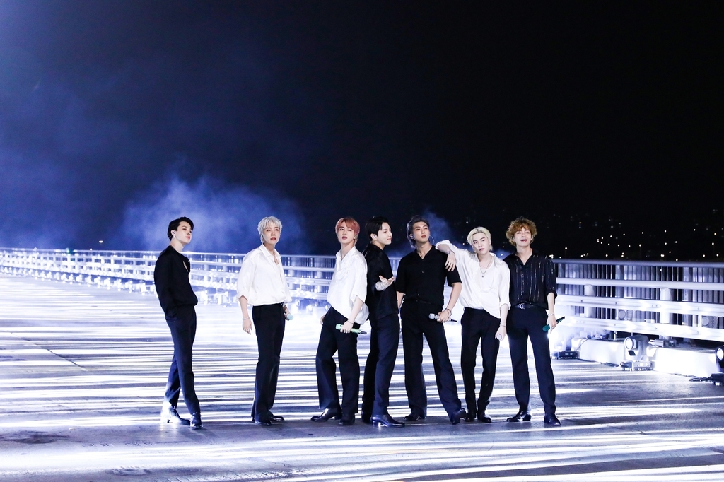 BTS poses on World Cup Bridge in Mapo-gu, western Seoul, ahead of their performance of "Butter" on "The Tonight Show Starring Jimmy Fallon" in 2021. (Big Hit Music)
